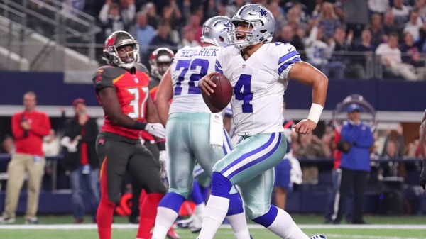 Dak Prescott celebrates after scoring a touchdown during the second quarter against the Tampa Bay Buccaneers (pic via Tom Pennington/Getty Images).